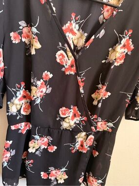 Sienna Sky Black Floral Wrap Blouse with Coral and Cream Flowers